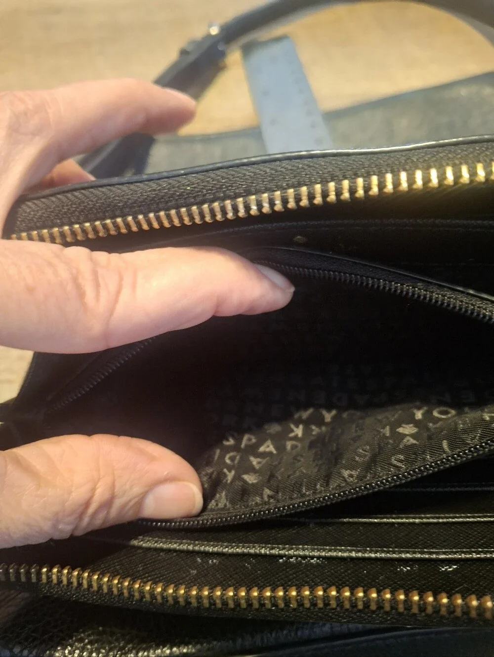 kate spade Black Saffiano Zip Around Wallet